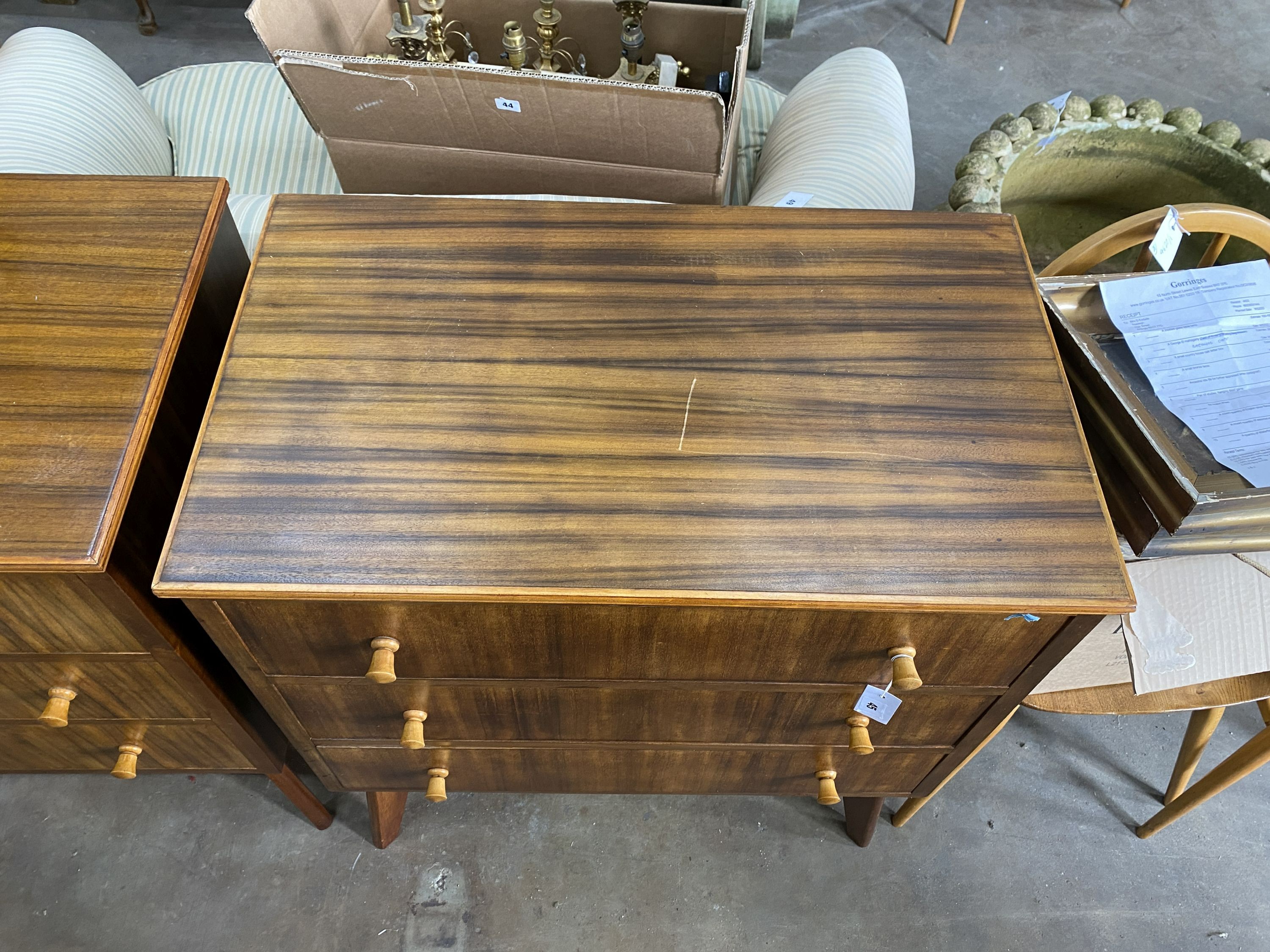 A pair of 1960s Morris Of Glasgow walnut three drawer chests, width 79cm, depth 47cm, height 86cm